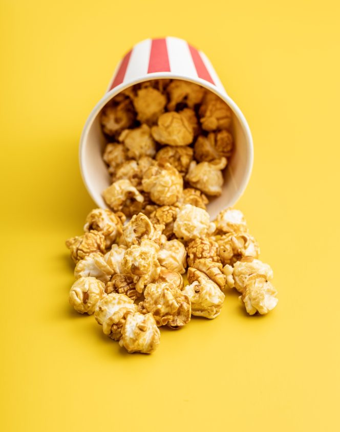 Sweet caramel popcorn in cup.